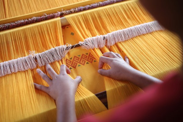 Où apprendre l'art du tissage traditionnel en Équateur ?